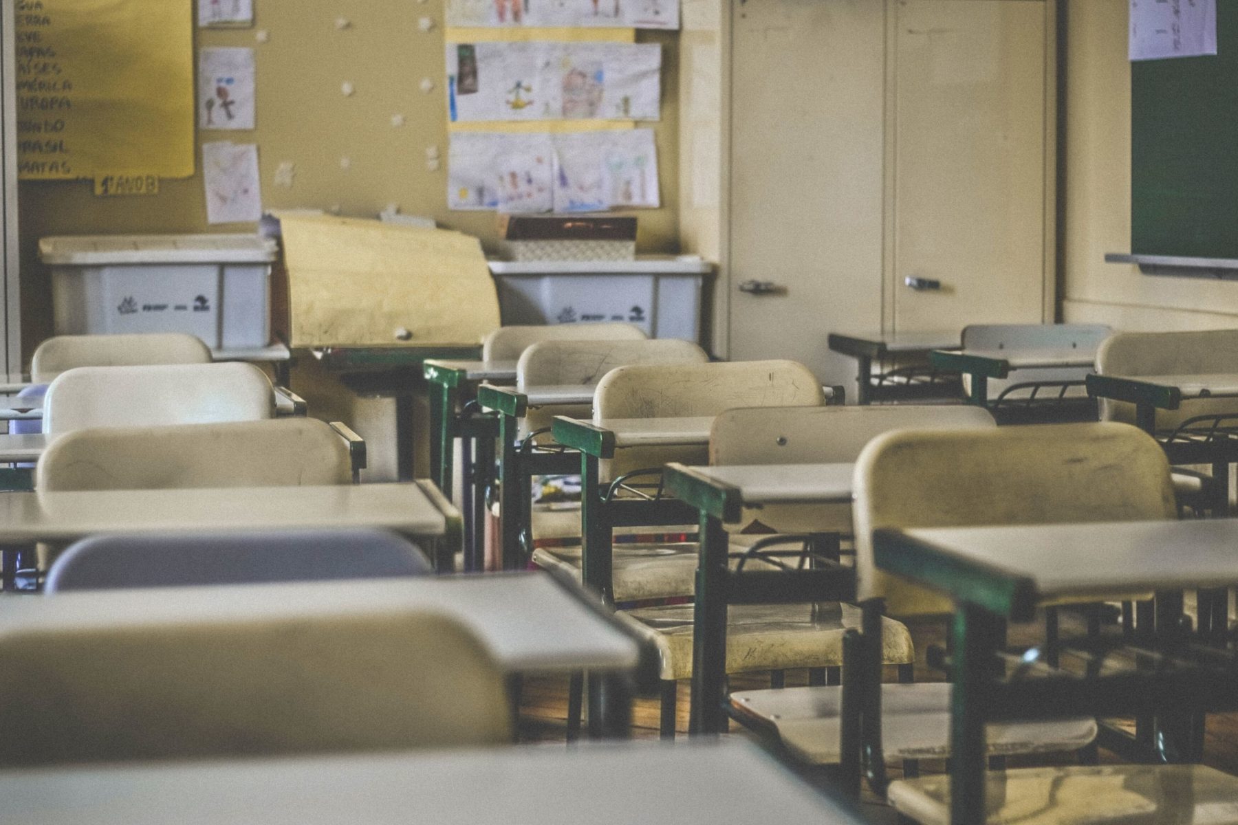 Empty classroom with desks and chairs